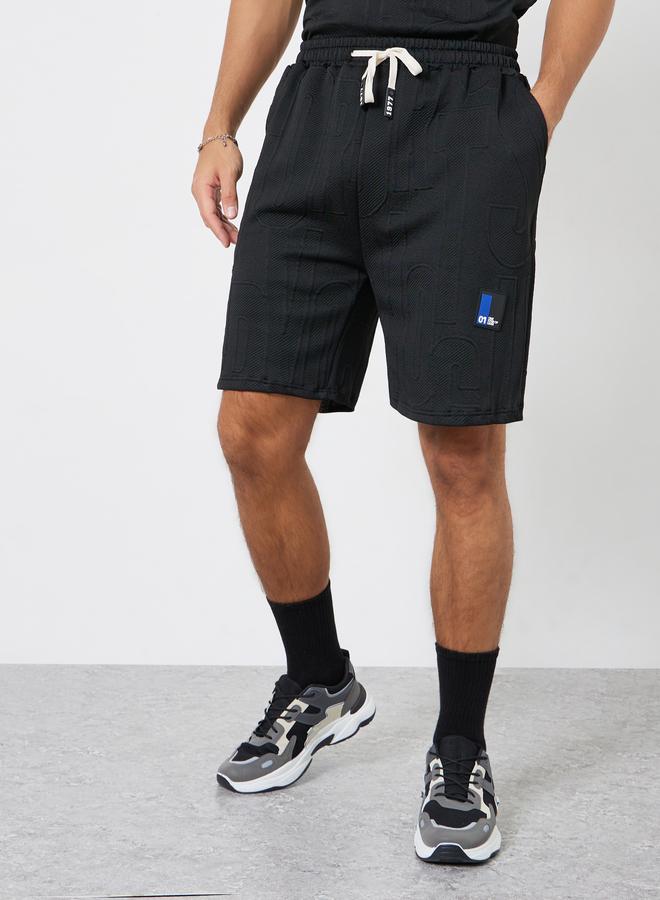 ستايلي طقم رجالي تي شيرت وشورت أسود بنقوش - Image 4